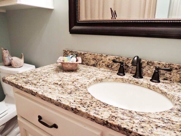 Muebles de baño con granito santa cecilia ligth